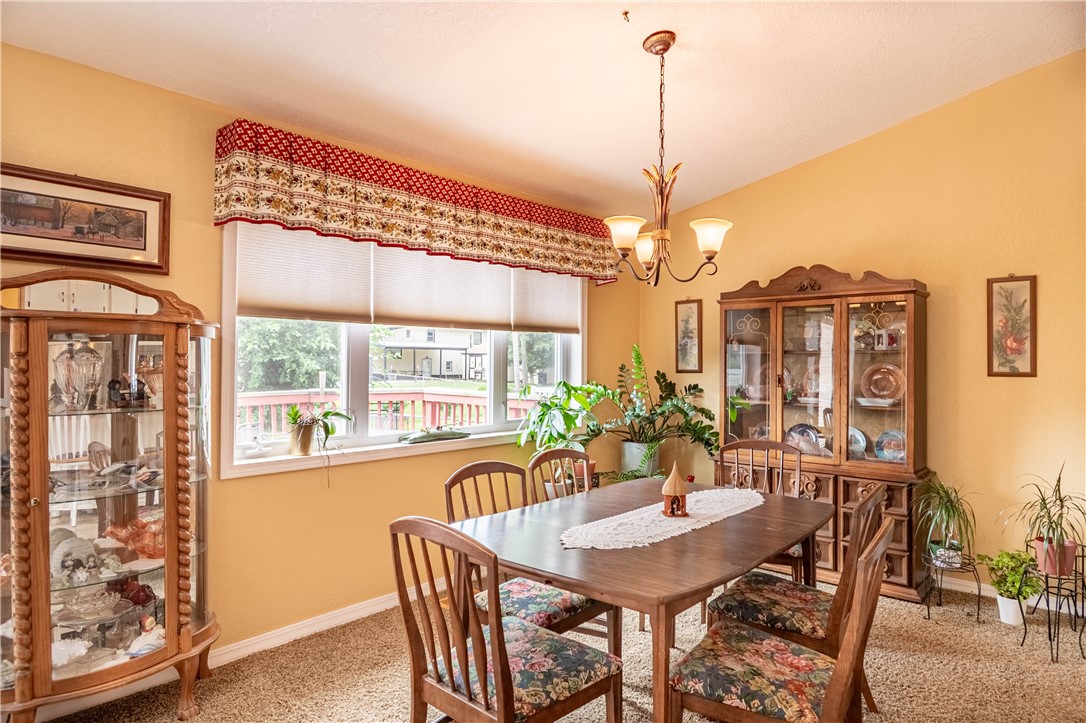 2121 Barding Avenue Decatur, IL 62526 - Photo 6 of 28 a view of a dining room with furniture window and outside view