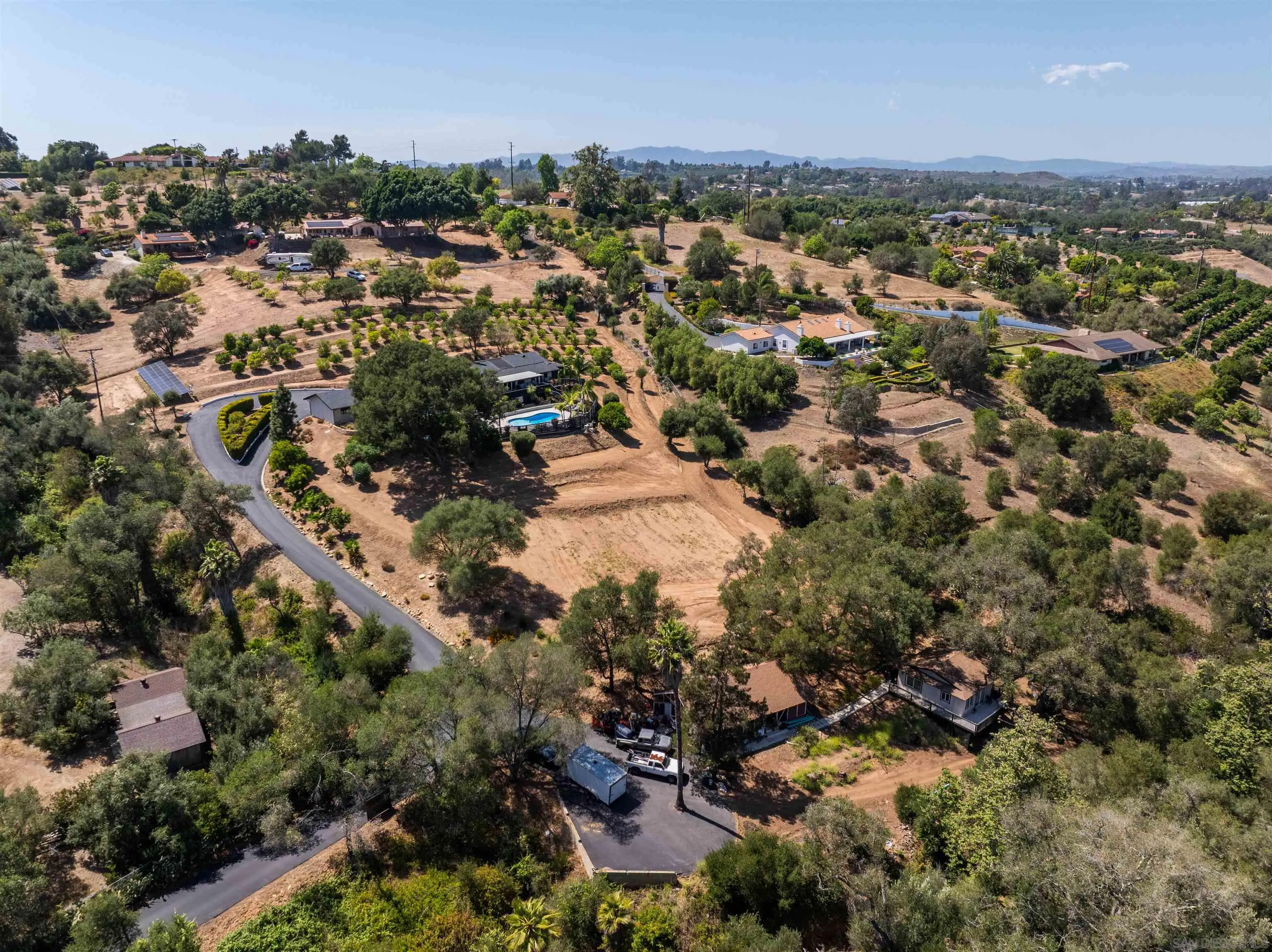 521 Rancho Camino Fallbrook, CA 92028 - Photo 69 of 72 an aerial view of residential houses with outdoor space and trees