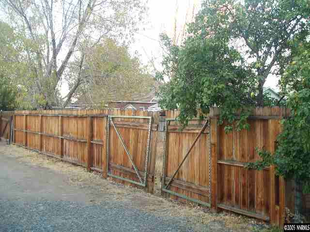 0 Lander Reno, NV 89509 - Photo 1 of 1 a view of backyard with wooden fence and large trees