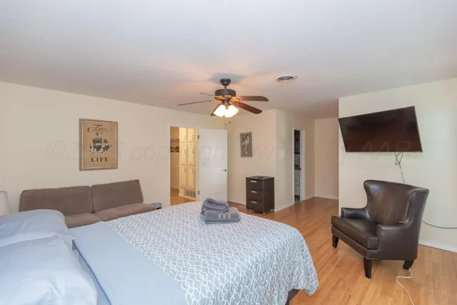 a kitchen with stainless steel appliances a stove sink microwave and cabinets
