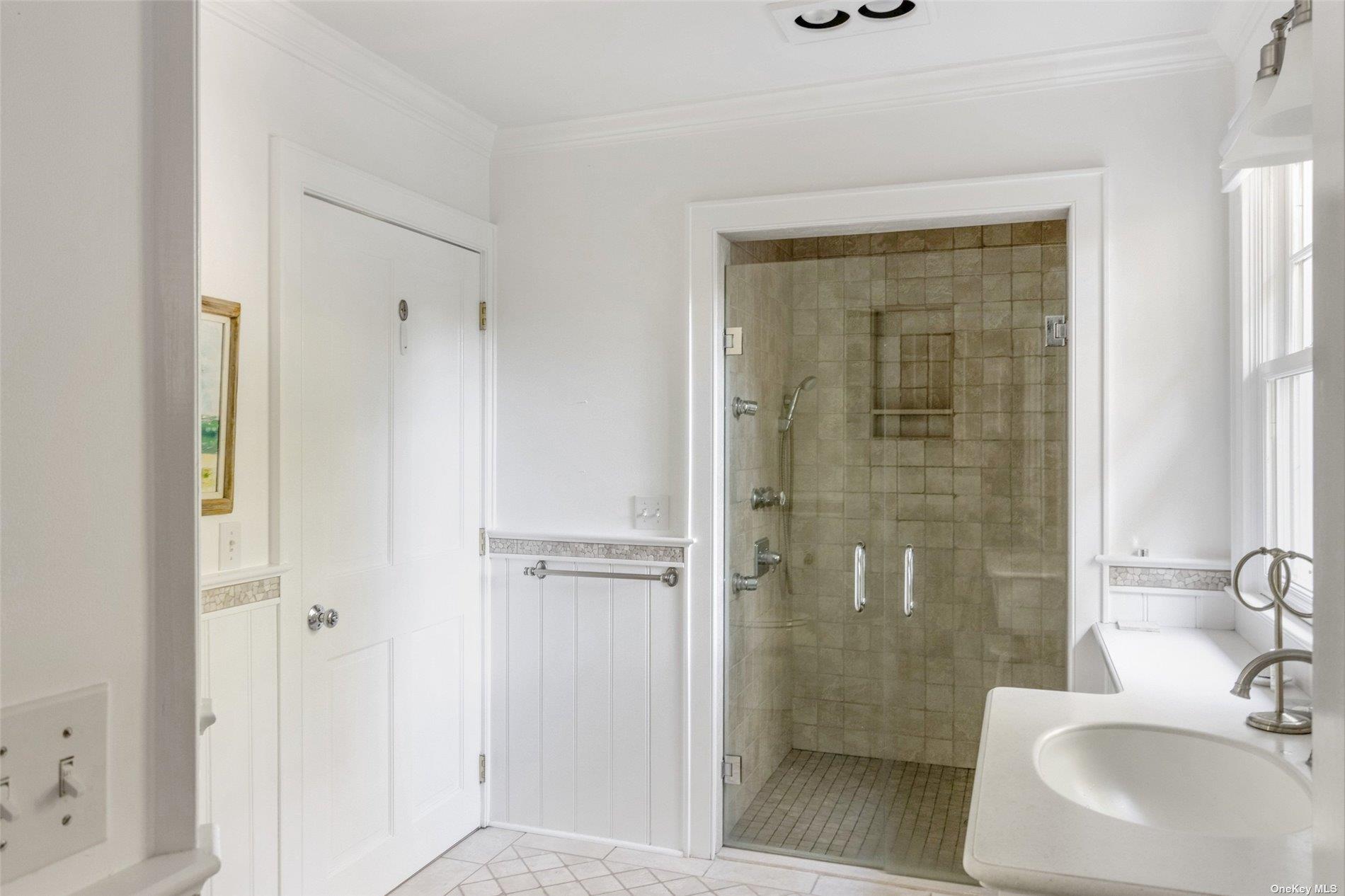 930 West Cove Road Cutchogue, NY 11935 - Photo 16 of 34 a bathroom with a shower