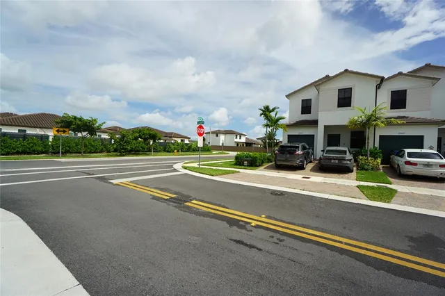 a view of street with houses