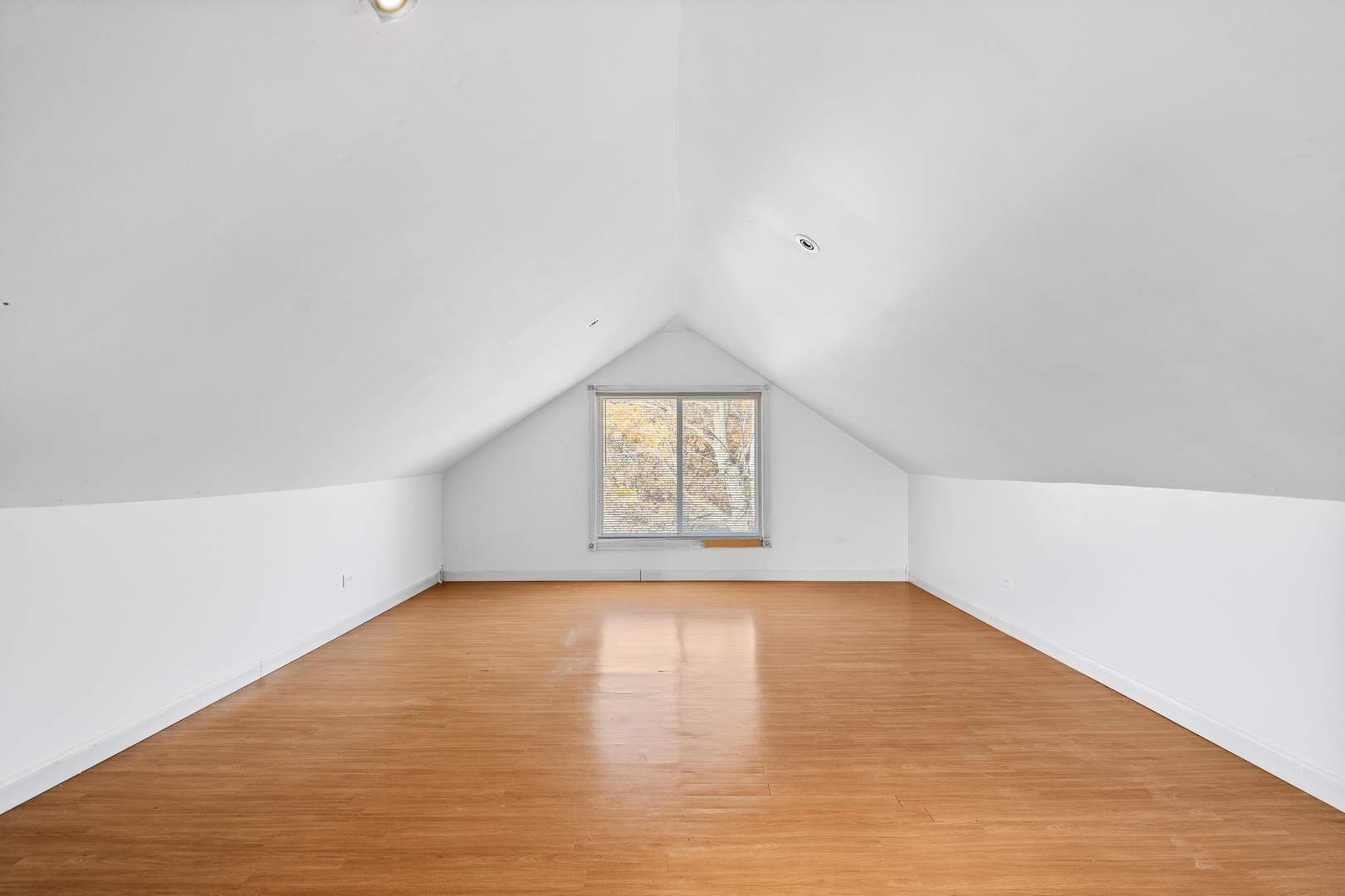 7845 45th Street Lyons, IL 60534 - Photo 13 of 31 a view of an empty room and window
