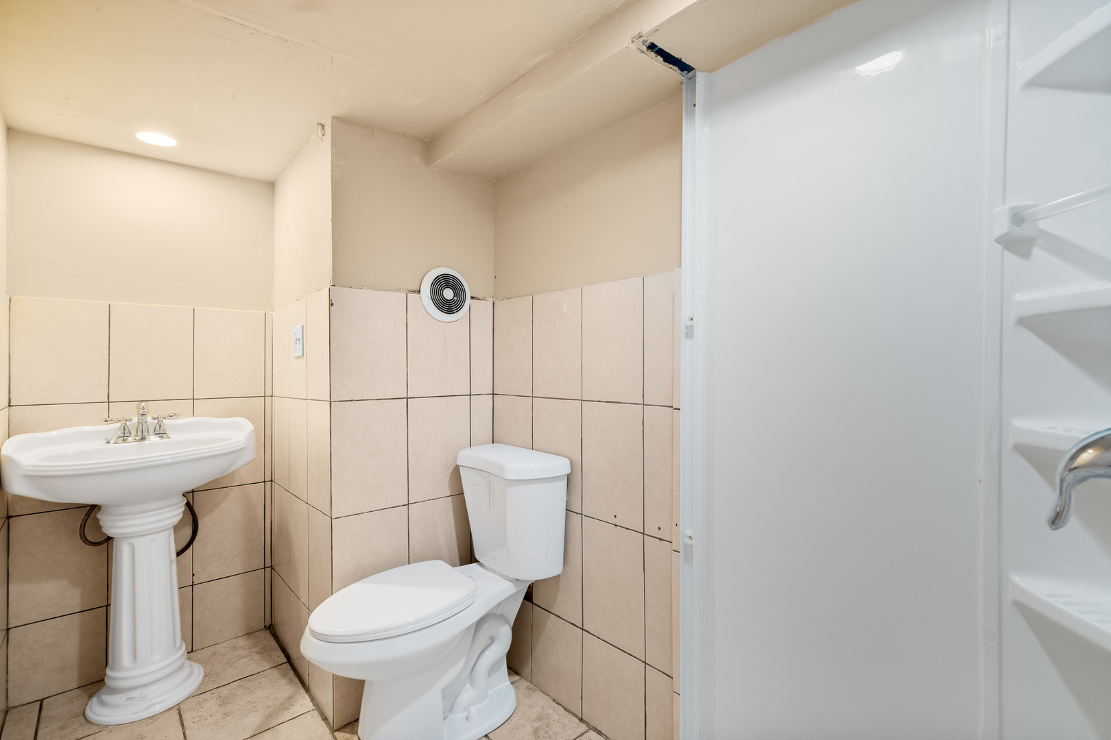 7845 45th Street Lyons, IL 60534 - Photo 23 of 31 a bathroom with a sink toilet and mirror