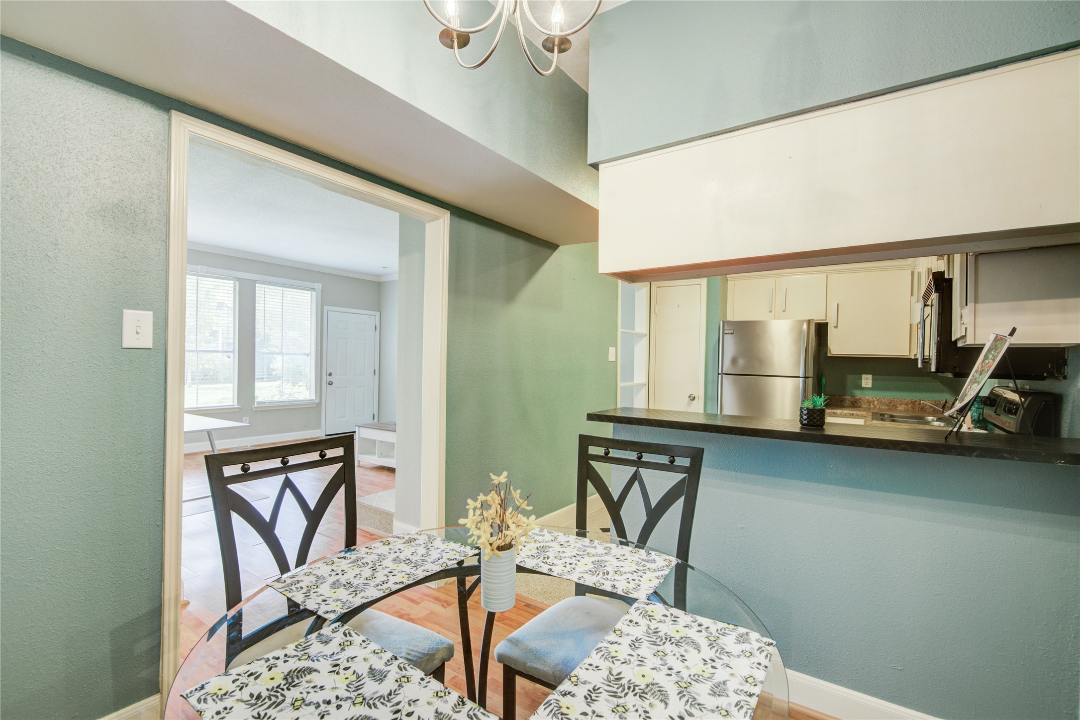 2100 Tanglewilde Street, Unit 349 Houston, TX 77063 - Photo 12 of 29 a bedroom with furniture and a window