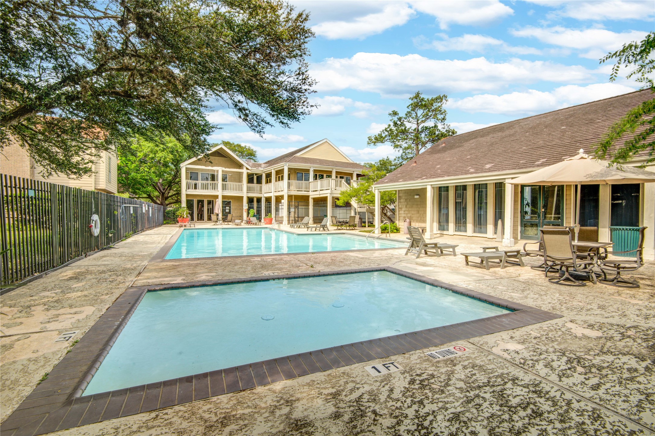 2100 Tanglewilde Street, Unit 349 Houston, TX 77063 - Photo 29 of 29 a view of a house with pool and sitting area