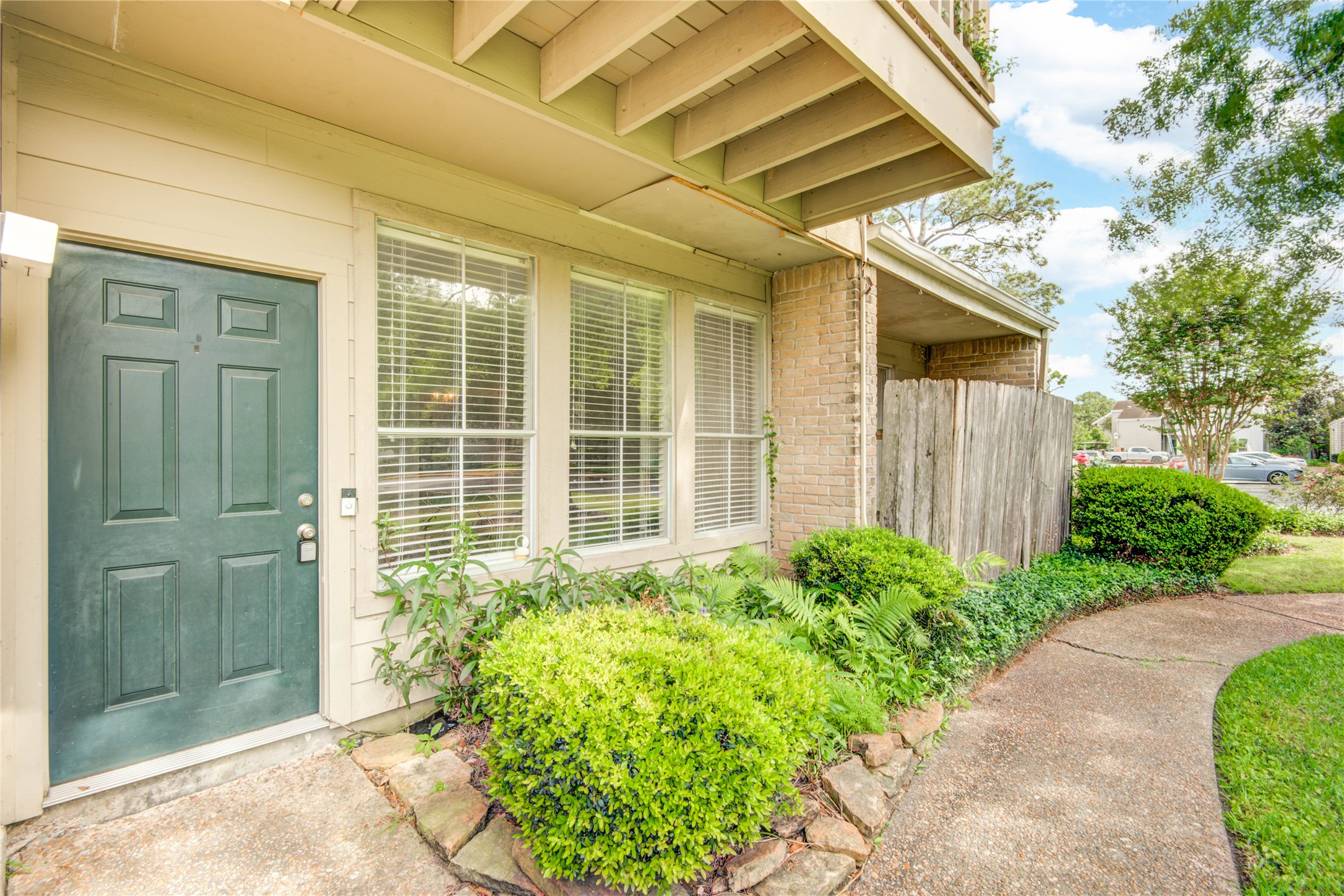 2100 Tanglewilde Street, Unit 349 Houston, TX 77063 - Photo 4 of 29 a view of a backyard with garden