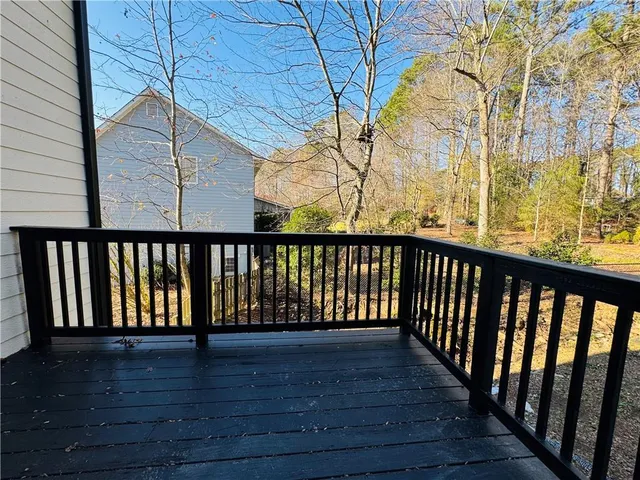 a view of room with wooden floor