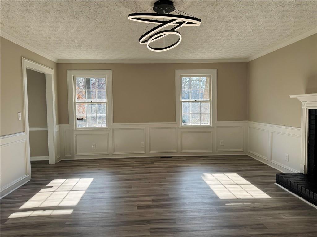 4795 Boxwood Way Northwest Acworth, GA 30102 - Photo 28 of 64 wooden floor in an empty room with a window