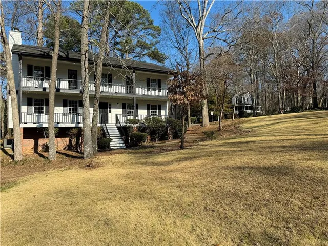 a building with trees in front of it
