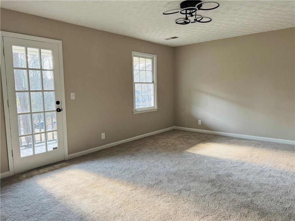 4795 Boxwood Way Northwest Acworth, GA 30102 - Photo 43 of 64 an empty room with a window