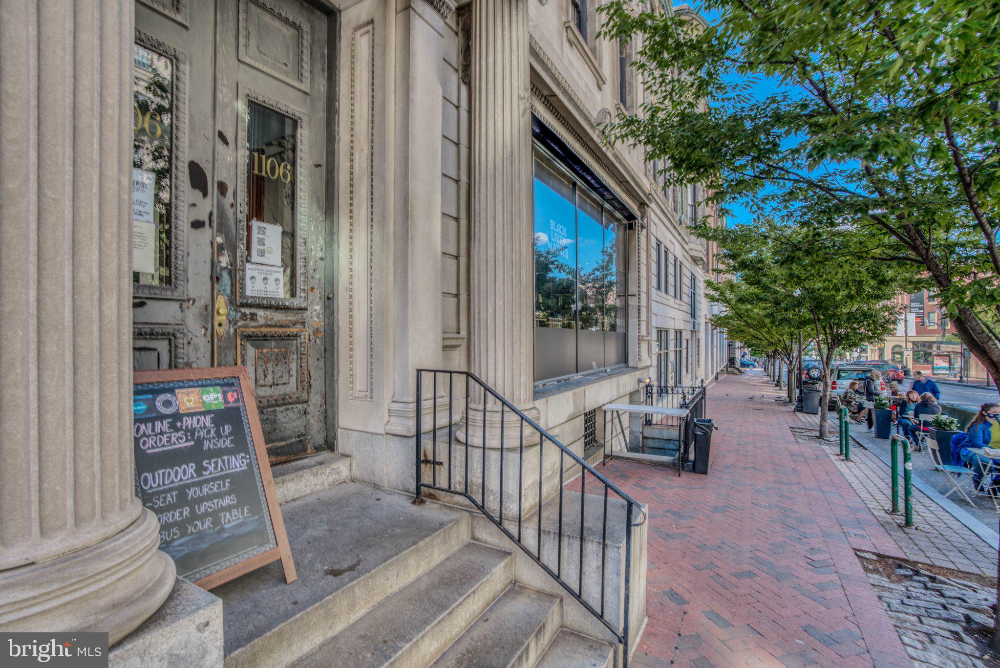 1018 North Charles Street, Unit R Baltimore, MD 21201 - Photo 16 of 17 Charming cafe with inviting outdoor space.