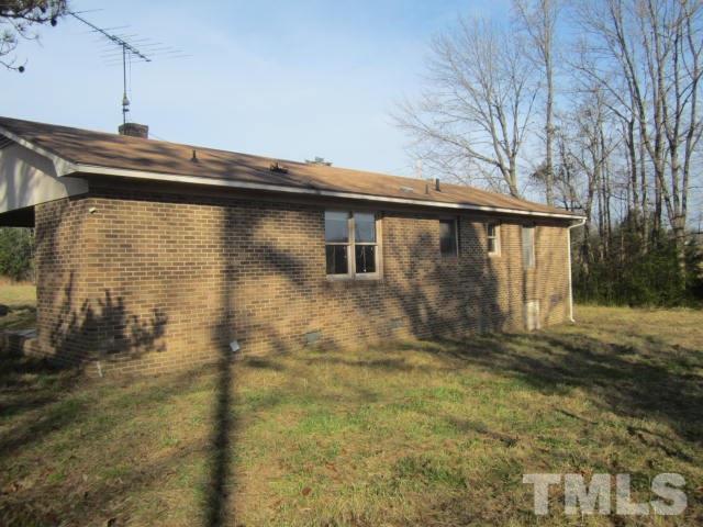9276 Dirgie Mine Road Roxboro, NC 27574 - Photo 2 of 14 a backyard of a house