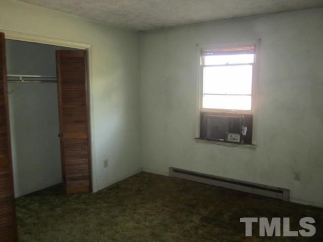 9276 Dirgie Mine Road Roxboro, NC 27574 - Photo 13 of 14 an empty room with a window