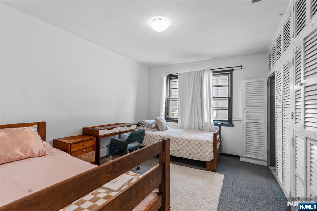 8 Hampton Road Clifton, NJ 07012 - Photo 11 of 16 a bedroom with furniture and window