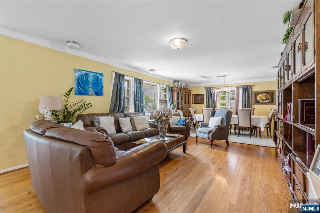 8 Hampton Road Clifton, NJ 07012 - Photo 4 of 16 a living room with furniture and a wooden floor