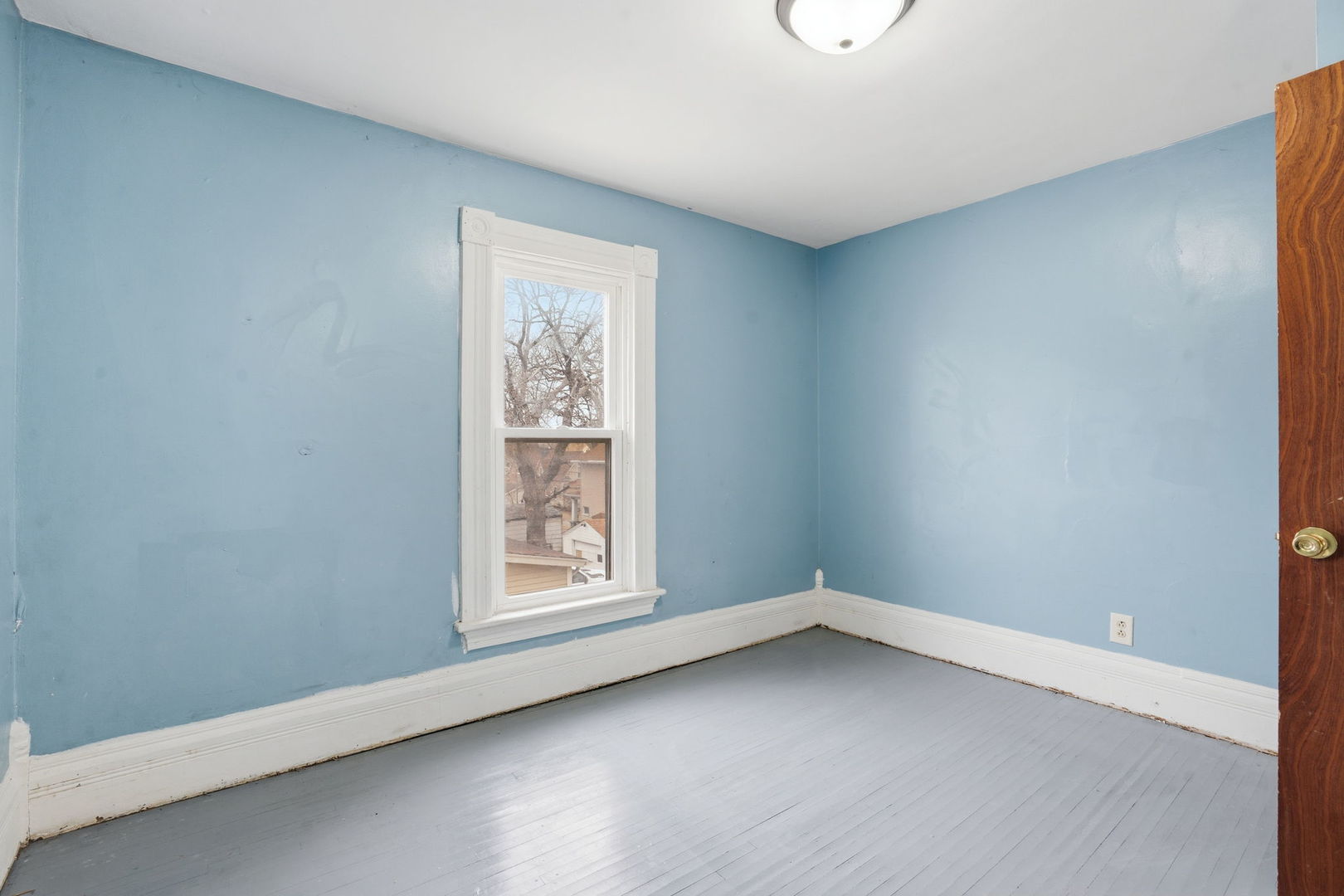 903 44th Street Rock Island, IL 61201 - Photo 16 of 28 an empty room with a window