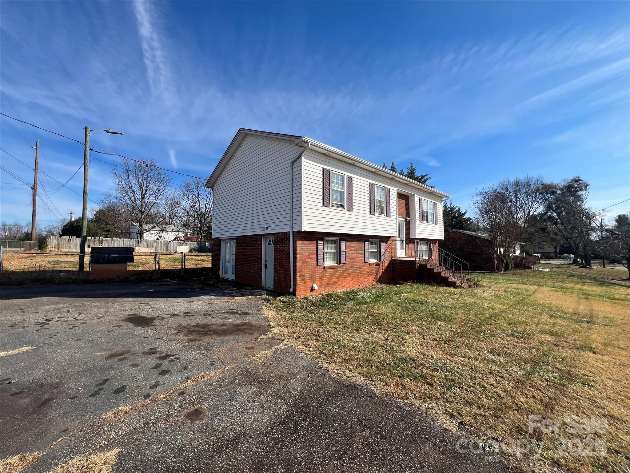 1182 Village Circle Hickory, NC 28602 - Photo 2 of 24 a view of a house with a patio