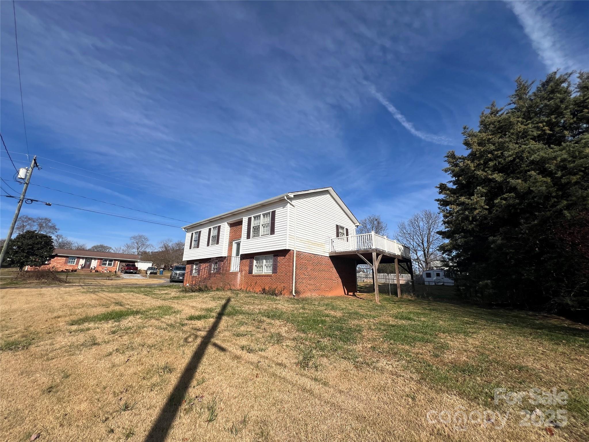 1182 Village Circle Hickory, NC 28602 - Photo 23 of 24 a front view of a house with a yard