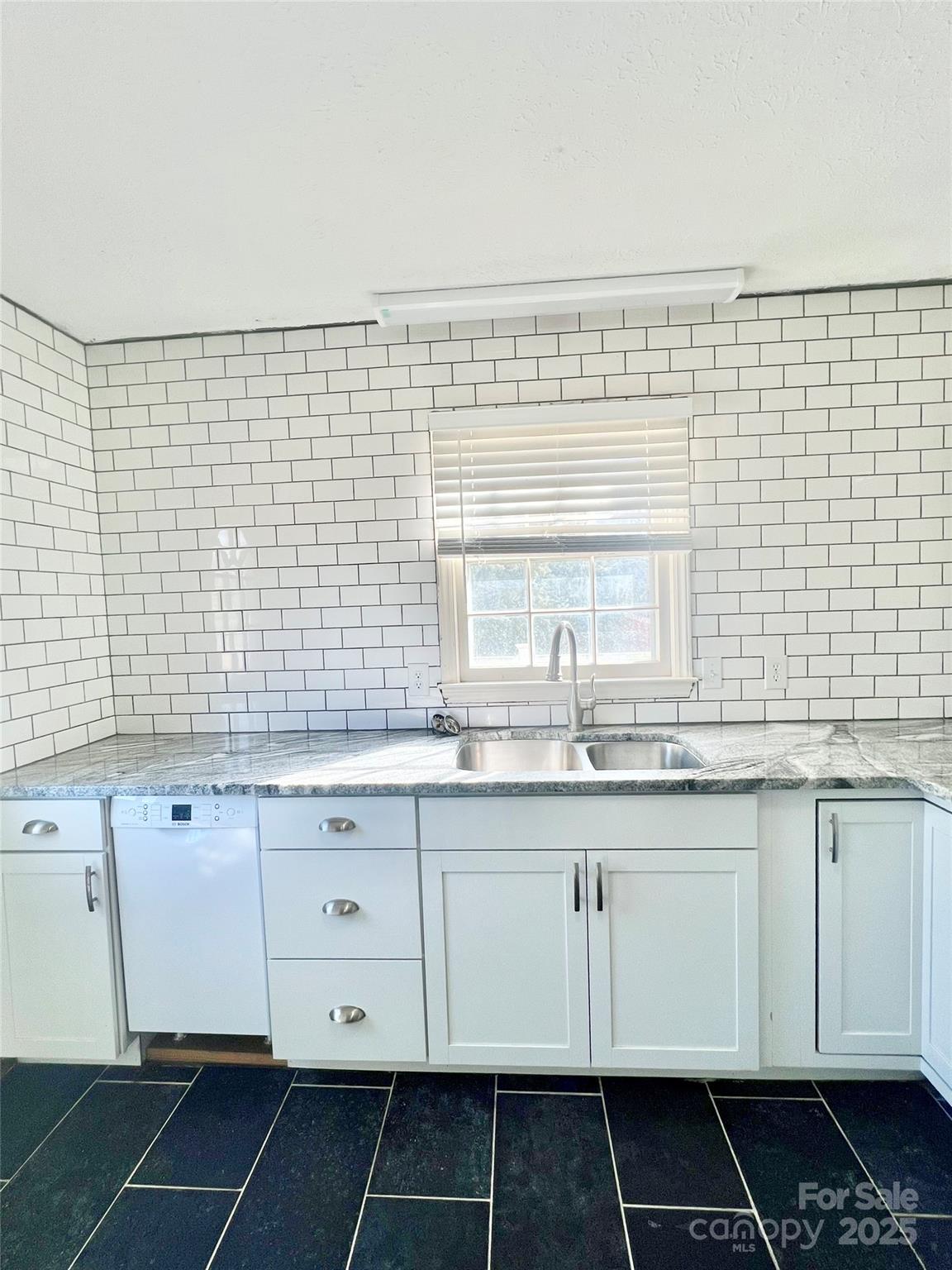 1182 Village Circle Hickory, NC 28602 - Photo 9 of 24 a bathroom with a sink and a mirror