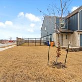 a view of a house with backyard