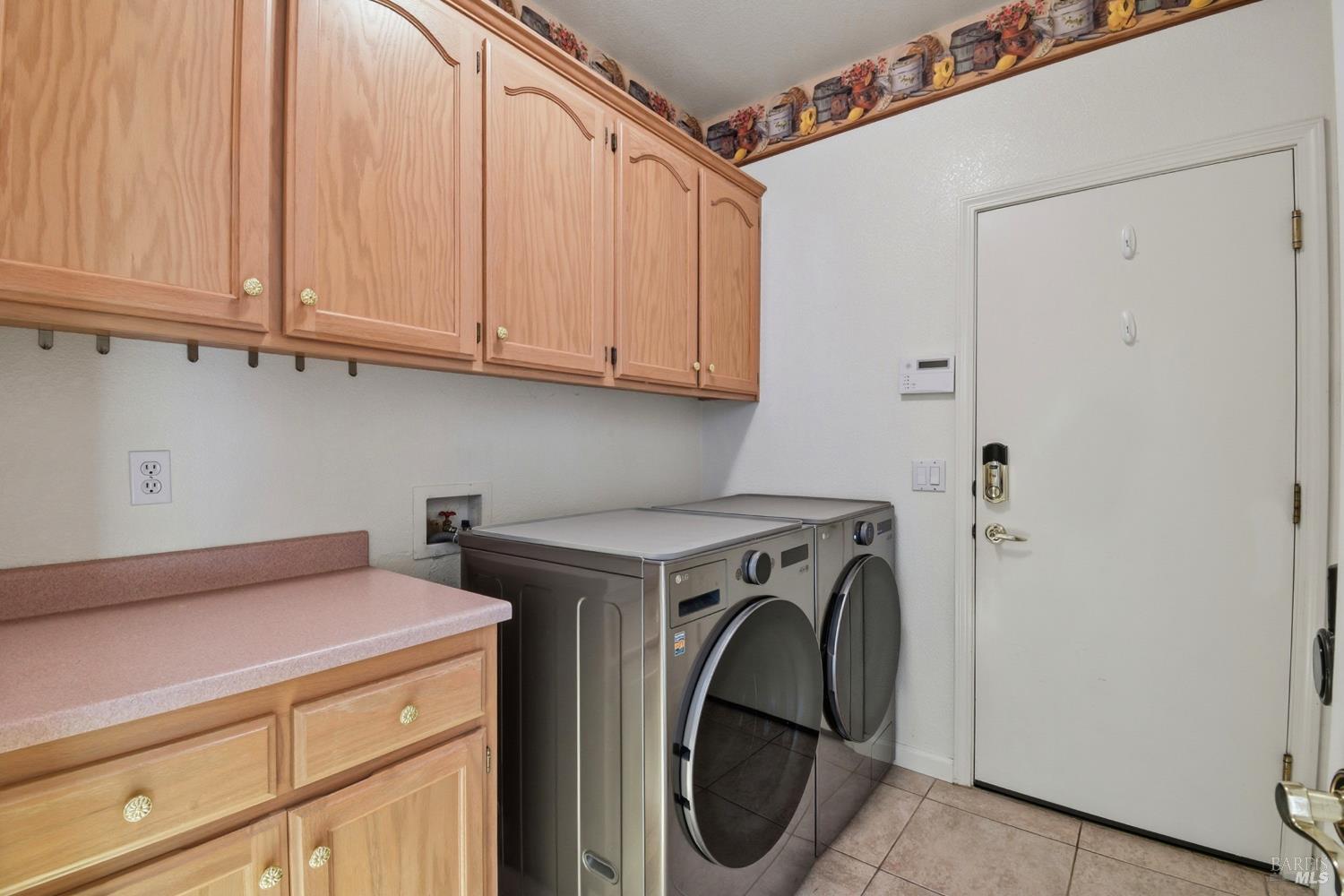5828 Owl Hill Avenue Santa Rosa, CA 95409 - Photo 31 of 39 a utility room with dryer and washer