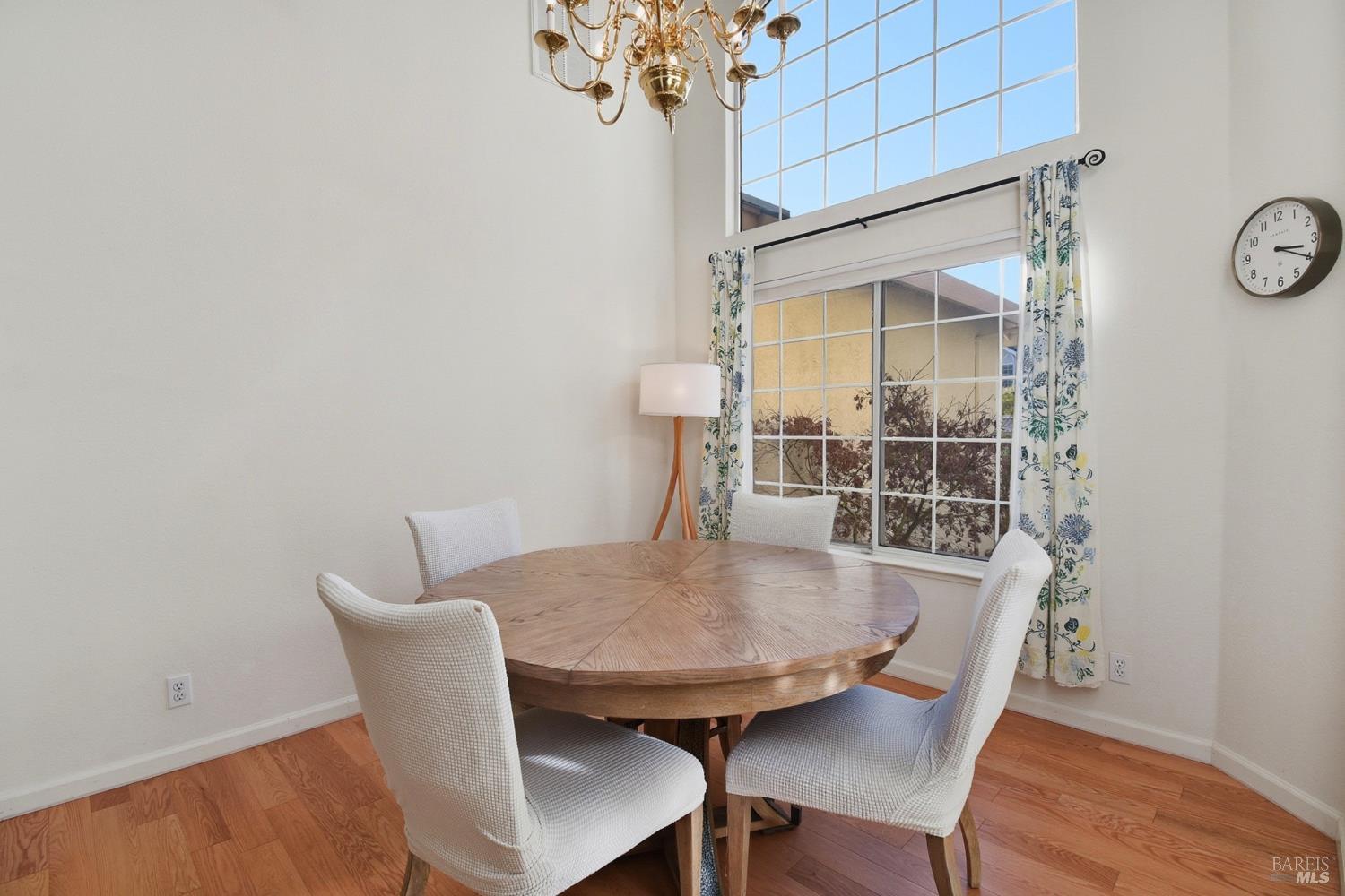 5828 Owl Hill Avenue Santa Rosa, CA 95409 - Photo 6 of 39 a view of a dining room with furniture and wooden floor
