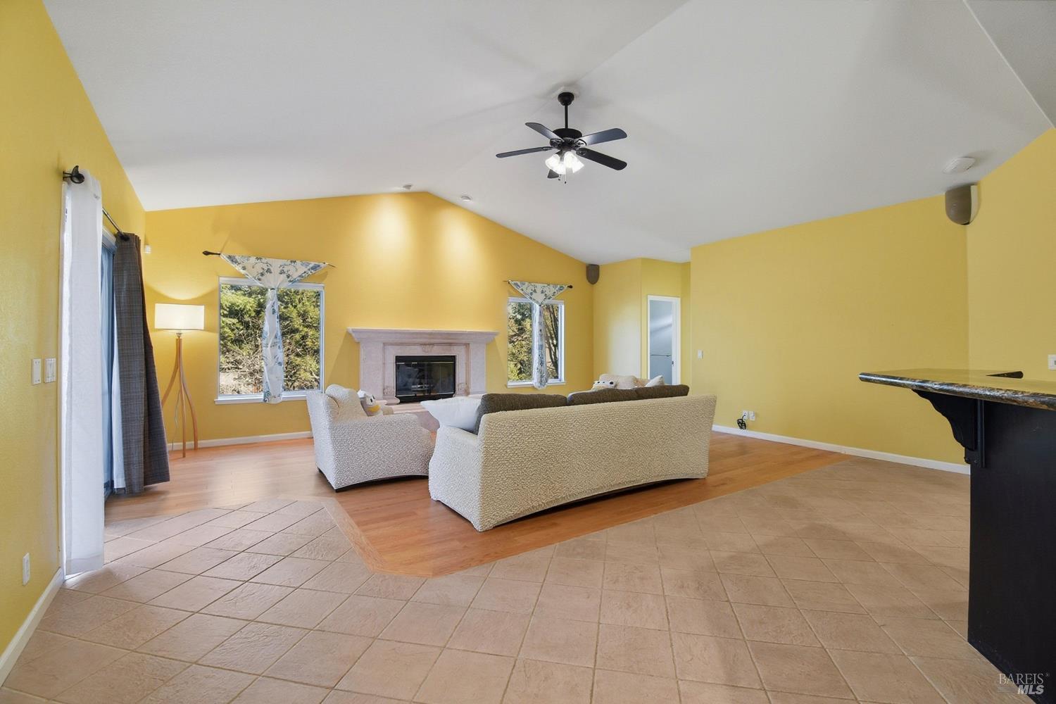 5828 Owl Hill Avenue Santa Rosa, CA 95409 - Photo 8 of 39 a living room with furniture and a fireplace