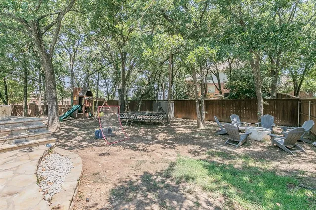 a view of a lake with a sitting area
