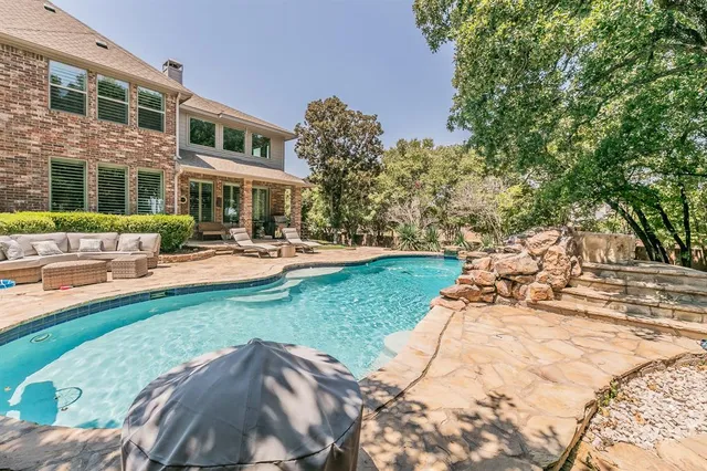 a view of a building with a yard