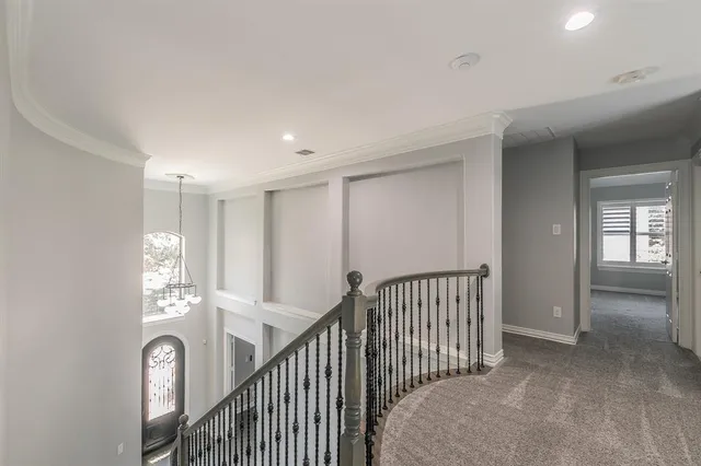 a view of hallway with livingroom