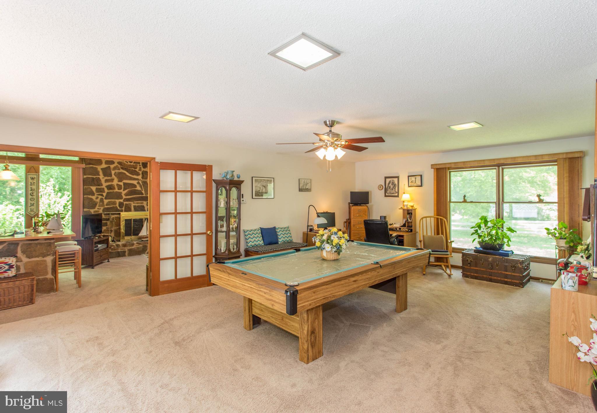 22167 Melson Road Georgetown, DE 19947 - Photo 16 of 38 a living room with furniture and a large window