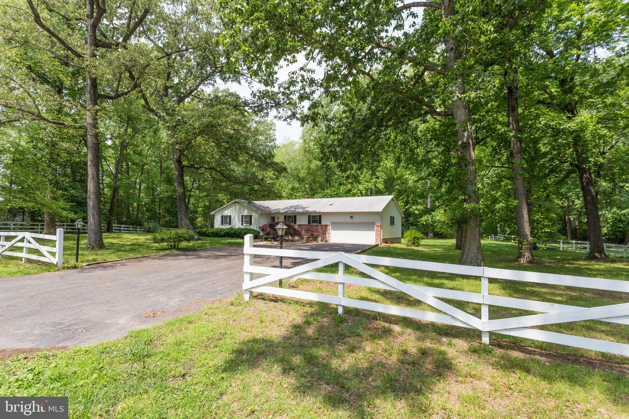 22167 Melson Road Georgetown, DE 19947 - Photo 2 of 38 a view of a house with a backyard