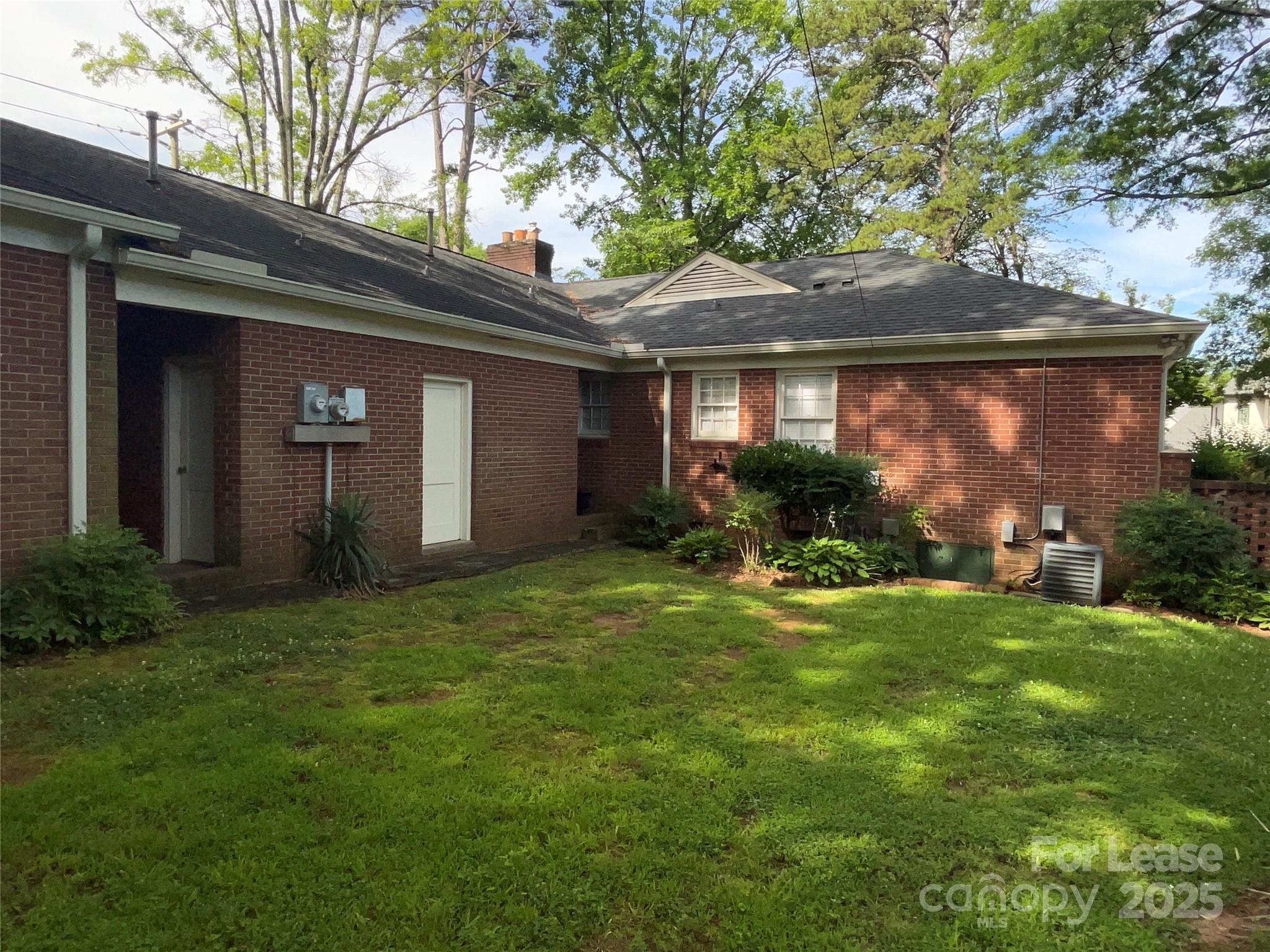 2518 Westfield Road Charlotte, NC 28209 - Photo 15 of 19 a front view of house with yard and outdoor seating