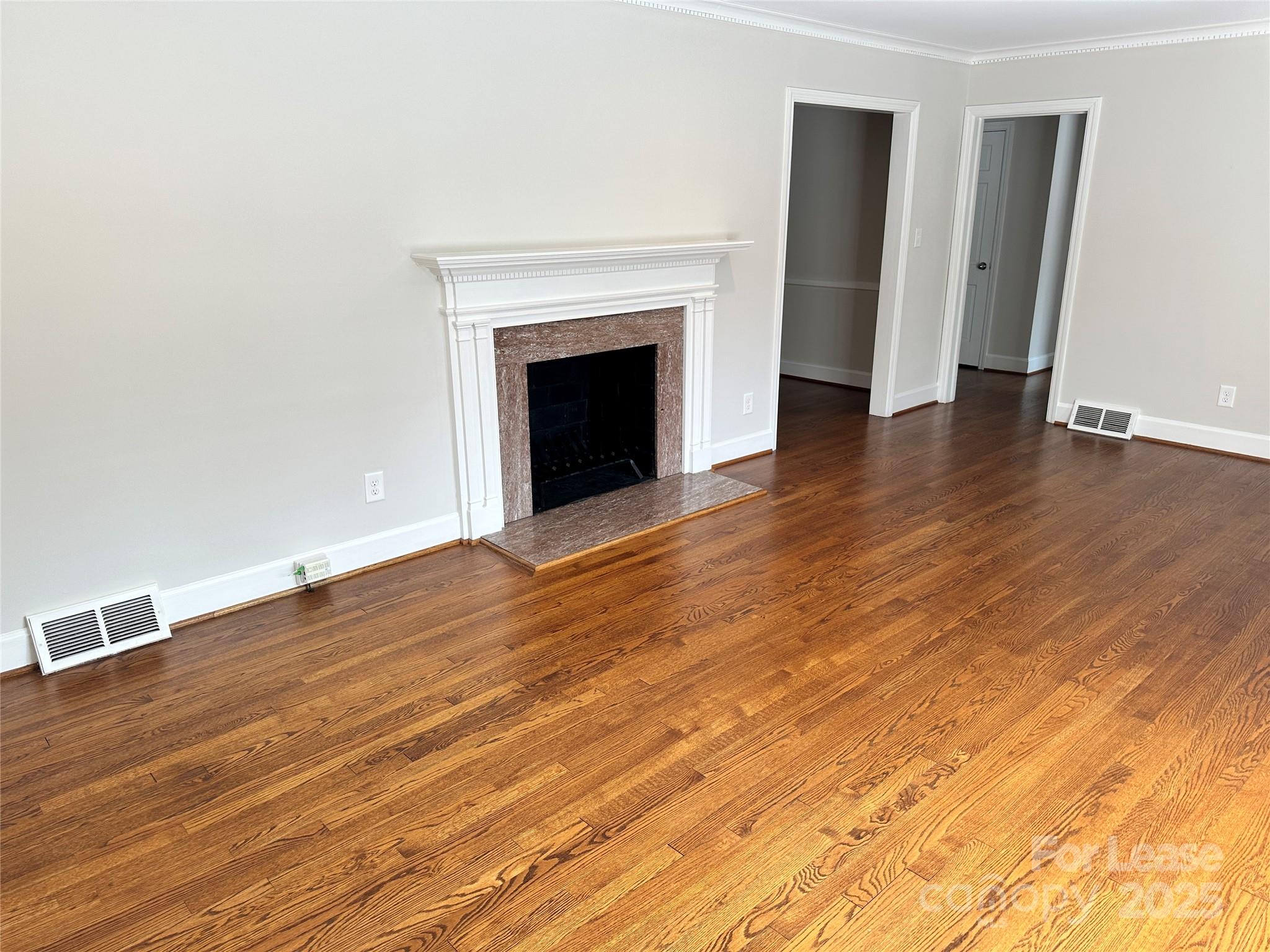 2518 Westfield Road Charlotte, NC 28209 - Photo 4 of 19 a view of an empty room with wooden floor