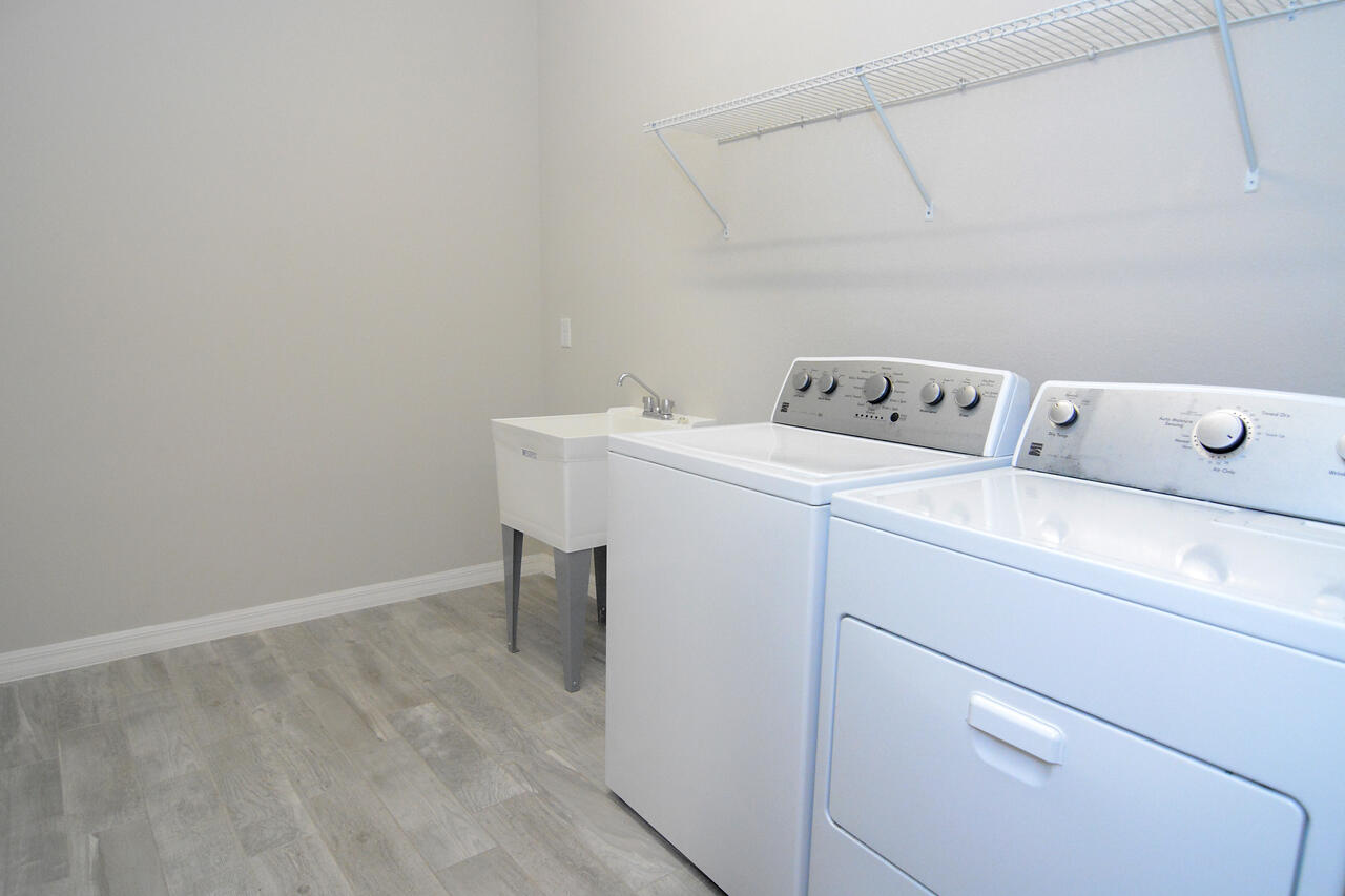 902 Foal Point Oviedo, FL 32765 - Photo 19 of 35 a utility room with dryer and washer