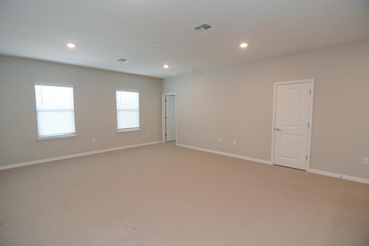 902 Foal Point Oviedo, FL 32765 - Photo 22 of 35 an empty room with windows