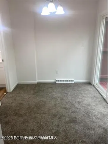 an empty room with an entryway