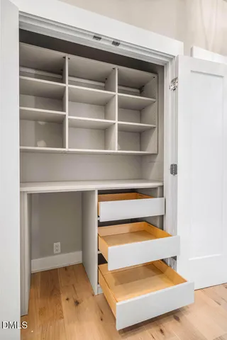a kitchen with stainless steel appliances a stove sink and cabinets