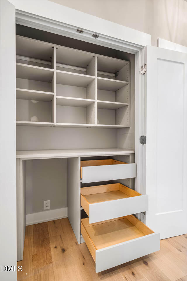 1905 Milan Street Durham, NC 27704 - Photo 14 of 42 a view of room with shelves