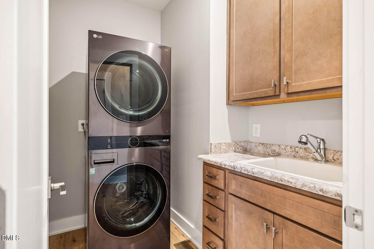 1905 Milan Street Durham, NC 27704 - Photo 27 of 42 a utility room with dryer and washer