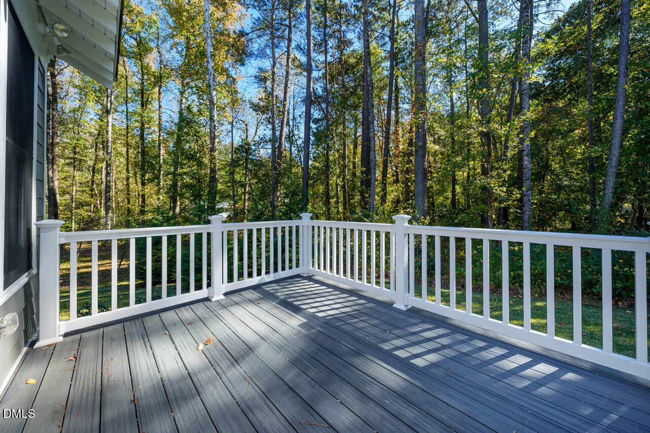 1905 Milan Street Durham, NC 27704 - Photo 28 of 42 a view of a wooden roof with trees