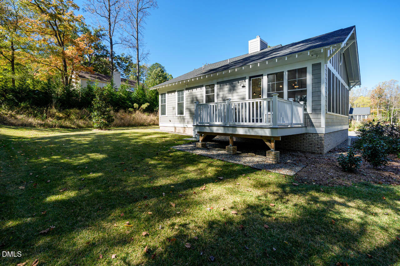 1905 Milan Street Durham, NC 27704 - Photo 32 of 42 a backyard of a house with yard table and chairs