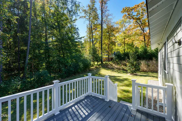 a view of a wooden roof with trees