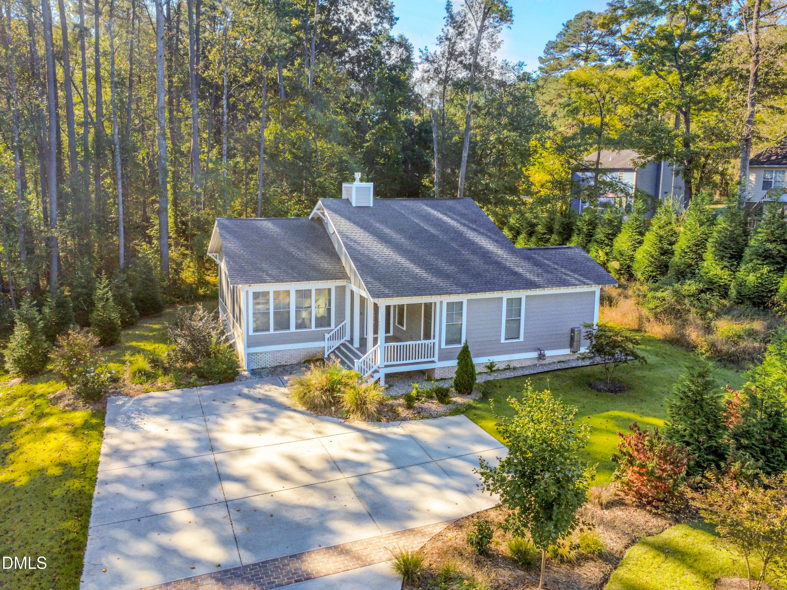 1905 Milan Street Durham, NC 27704 - Photo 38 of 42 a view of a big house with a big yard plants and large trees