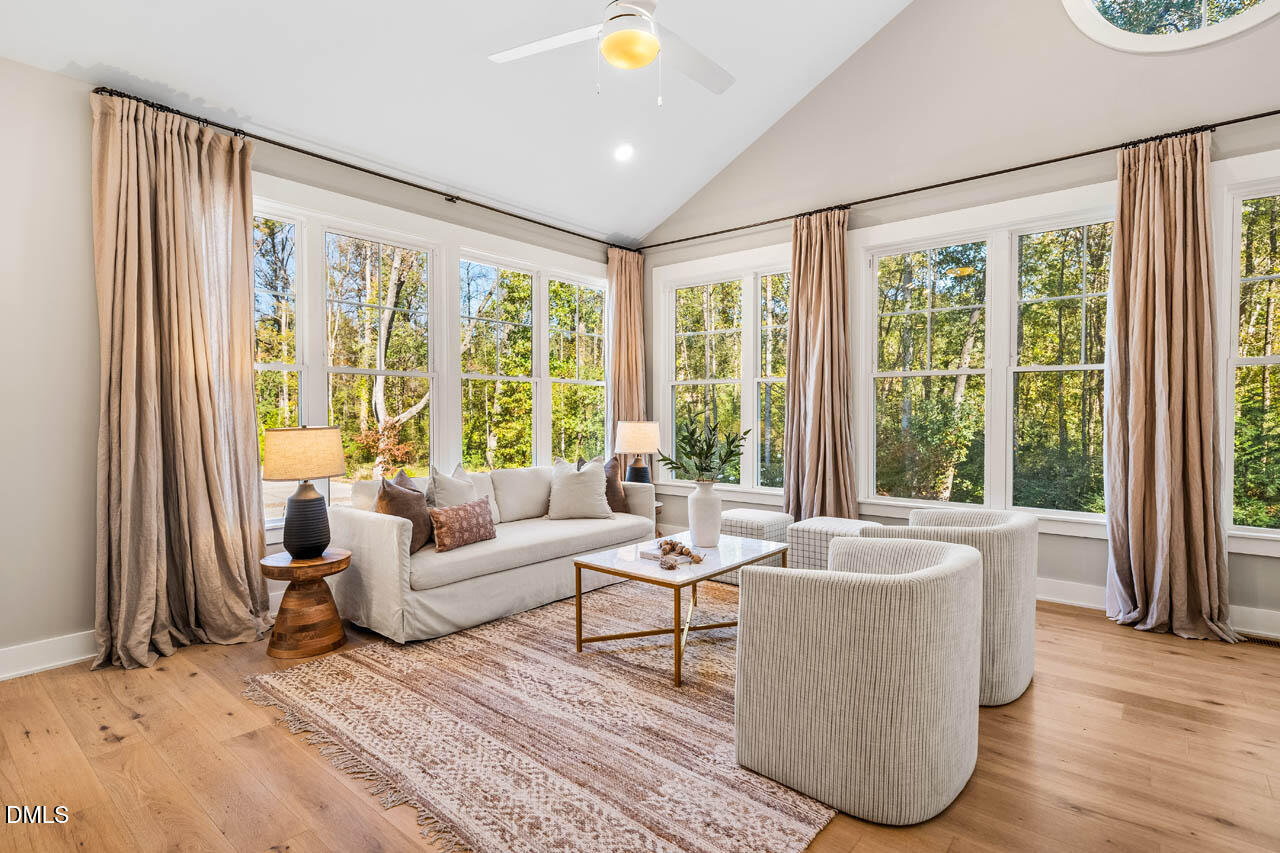1905 Milan Street Durham, NC 27704 - Photo 5 of 42 a living room with furniture and a large window