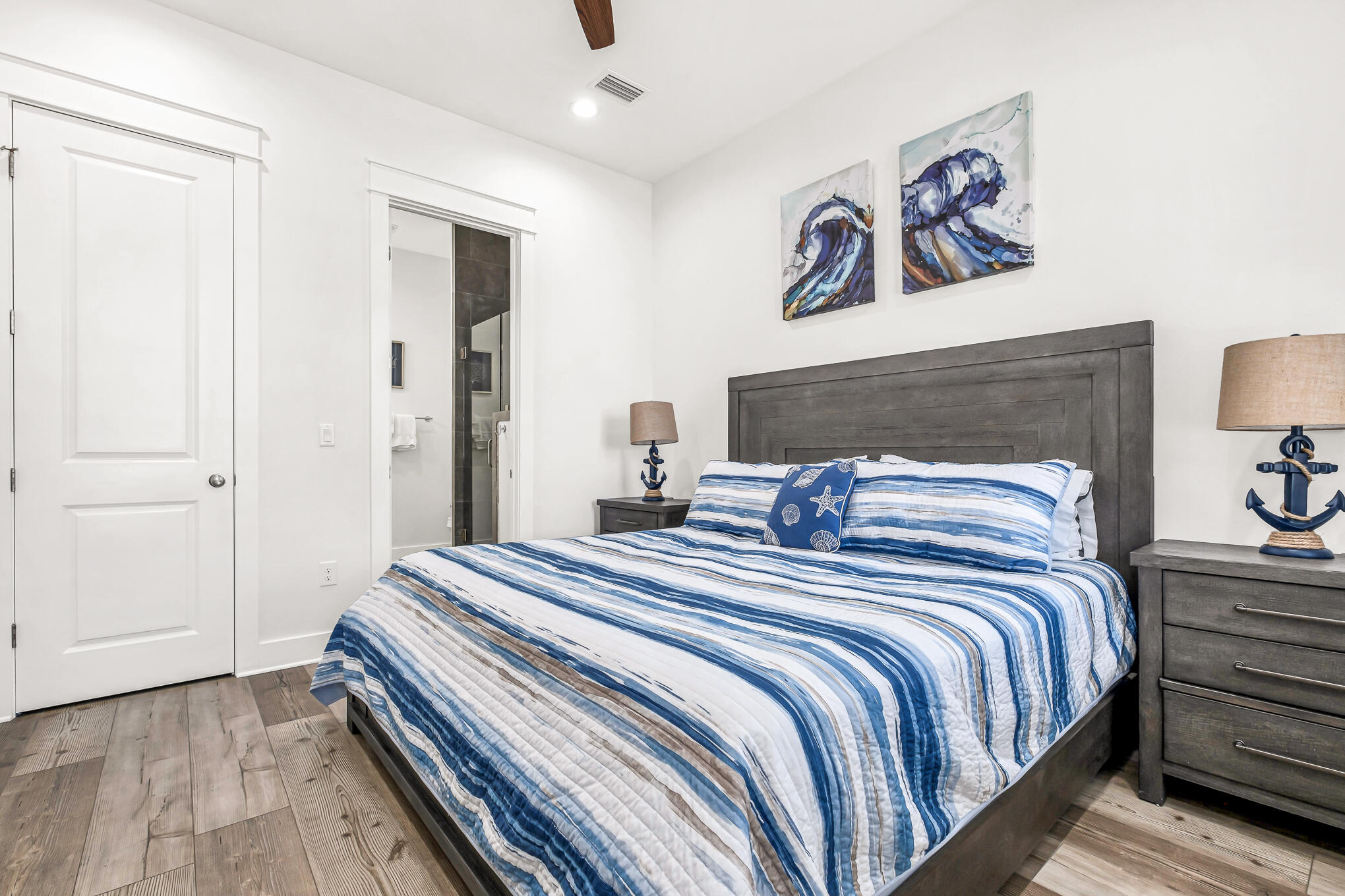 80 Sunfish Street Destin, FL 32541 - Photo 21 of 51 a bedroom with a bed and painting on the wall
