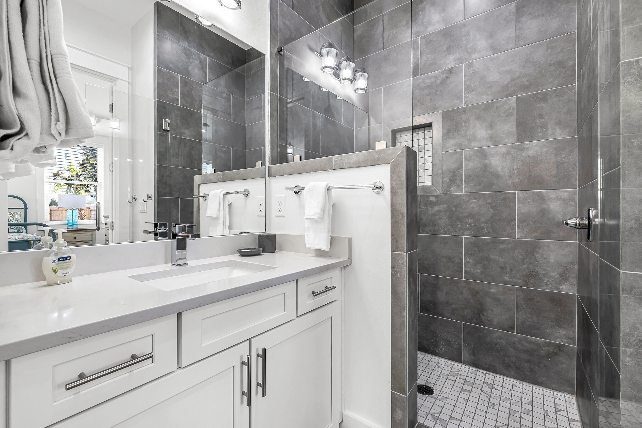 80 Sunfish Street Destin, FL 32541 - Photo 27 of 51 a bathroom with a sink double vanity and a shower