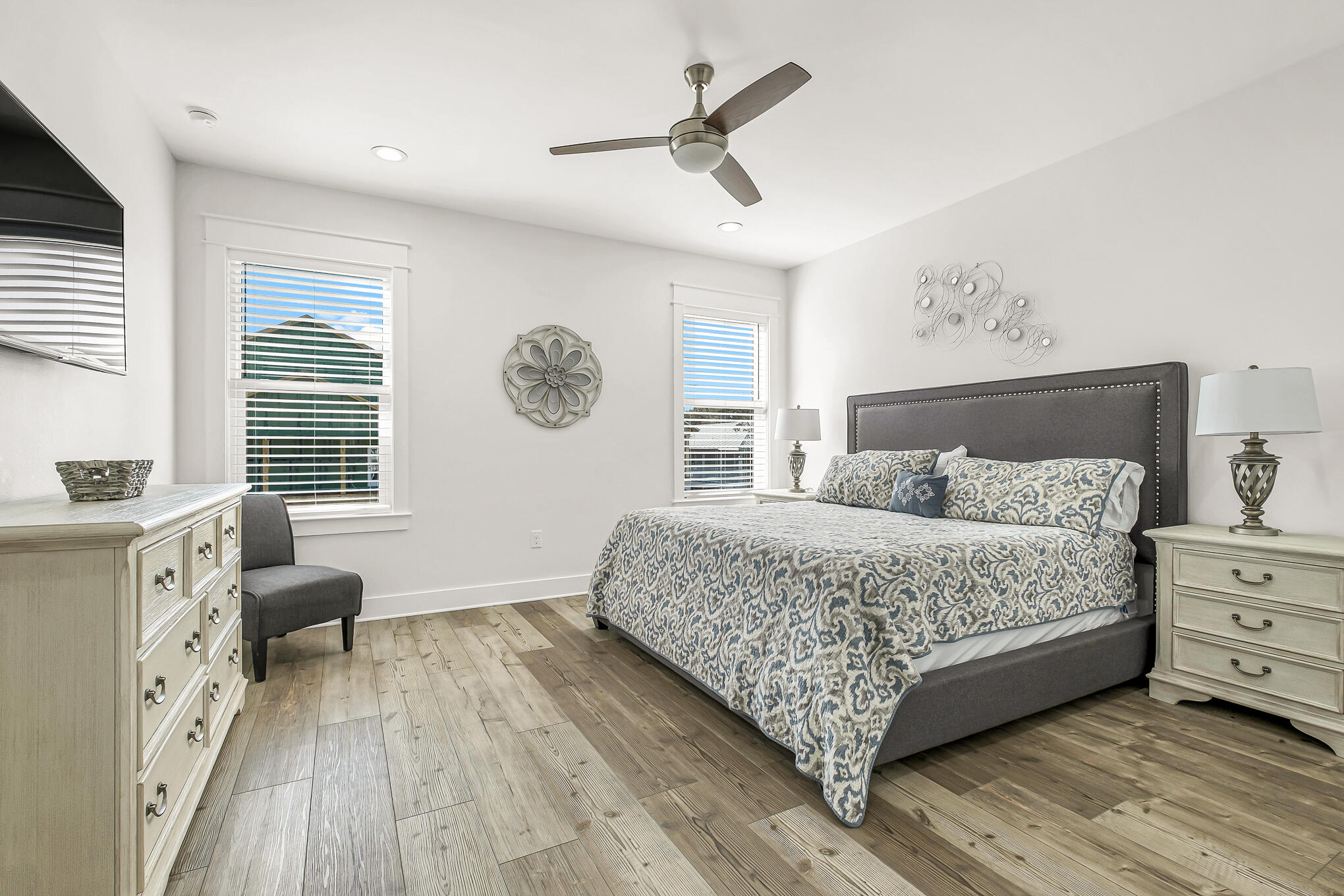 80 Sunfish Street Destin, FL 32541 - Photo 43 of 51 a bedroom with a bed and a chandelier