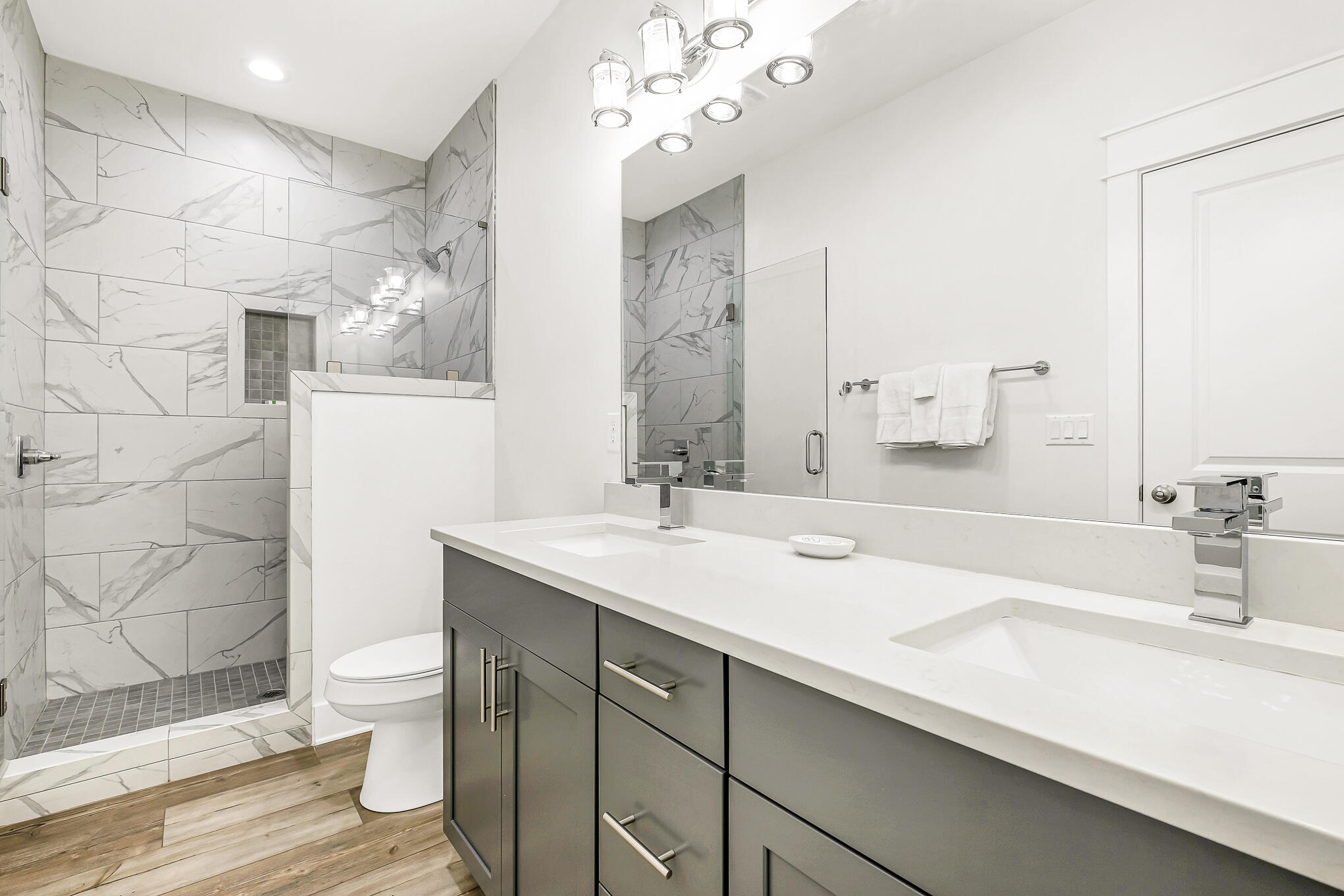 80 Sunfish Street Destin, FL 32541 - Photo 45 of 51 a bathroom with a sink a toilet and shower